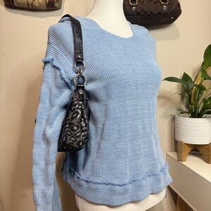 Blue waffle knit free people sweater with fringe detailing #knitwear